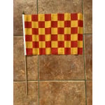 Checkered red/yellow large hand flag